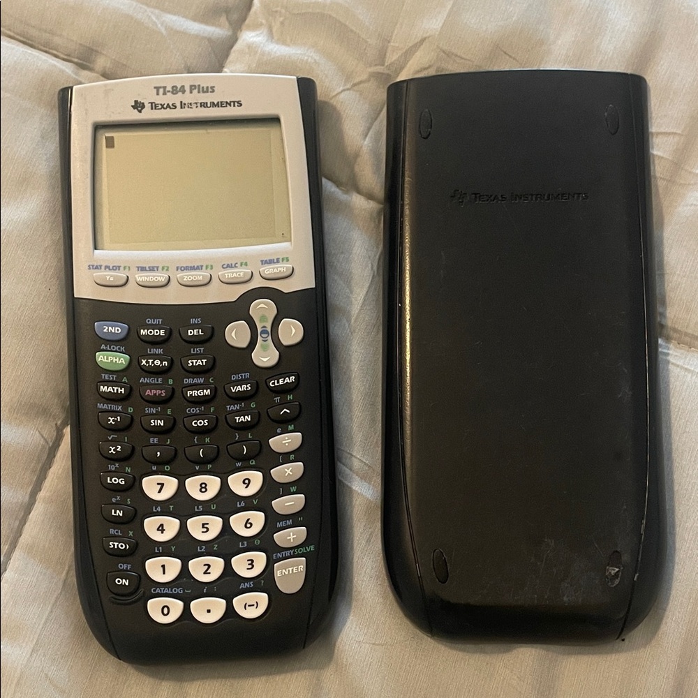 Texas Instruments TI-84 Plus Graphing Calculator in Black and White